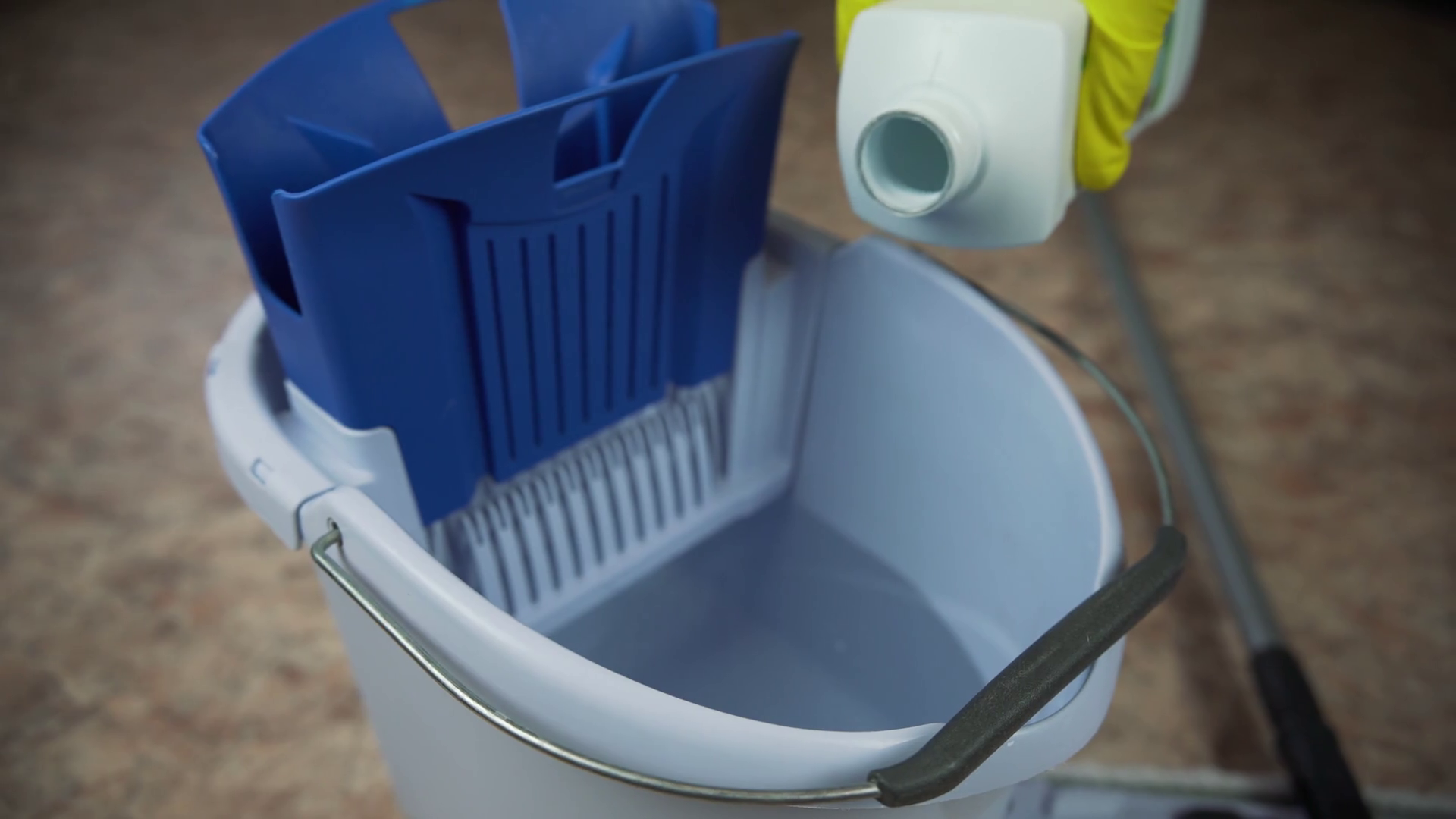 pour detergent into the bucket to clean the room. Stock Video Footage