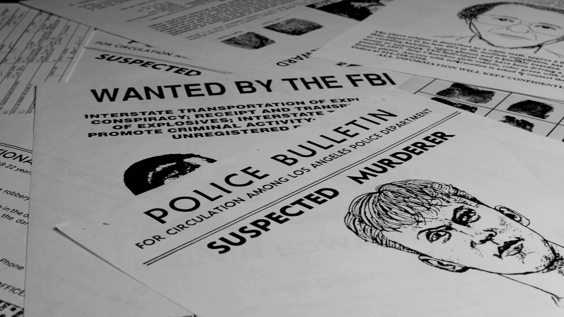 MULTIPLE NON DESCRIPT WANTED POSTERS CAMERA PAN IN 4K 10 BIT ECU