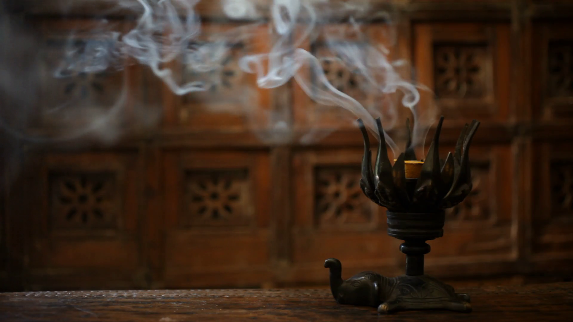 MS Smoke from burning incense in metal holder / Singapore Stock Video