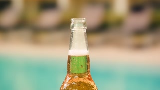 Opening open Beer cheers Celebration concept - close up hands holding up glasses of beer of people group in outdoor party during their