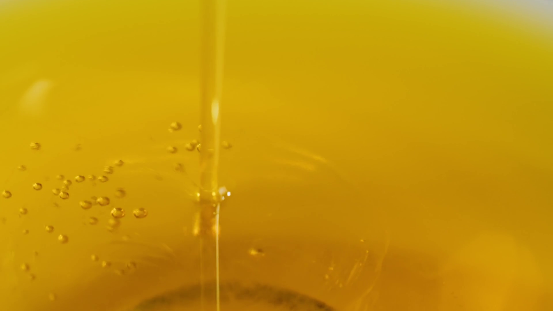 Pouring olive linen oil sunflower in different dishes close-up. Using in  cooking for frying foods or as a salad dressing omega 3. Olive oil, image size:1920x1080