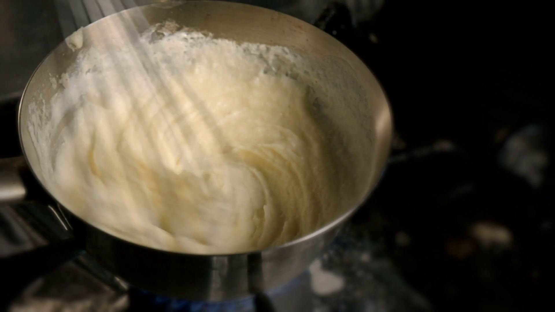 Crushing Boiled Potatoes With Potato Masher Stock Footage SBV308826525