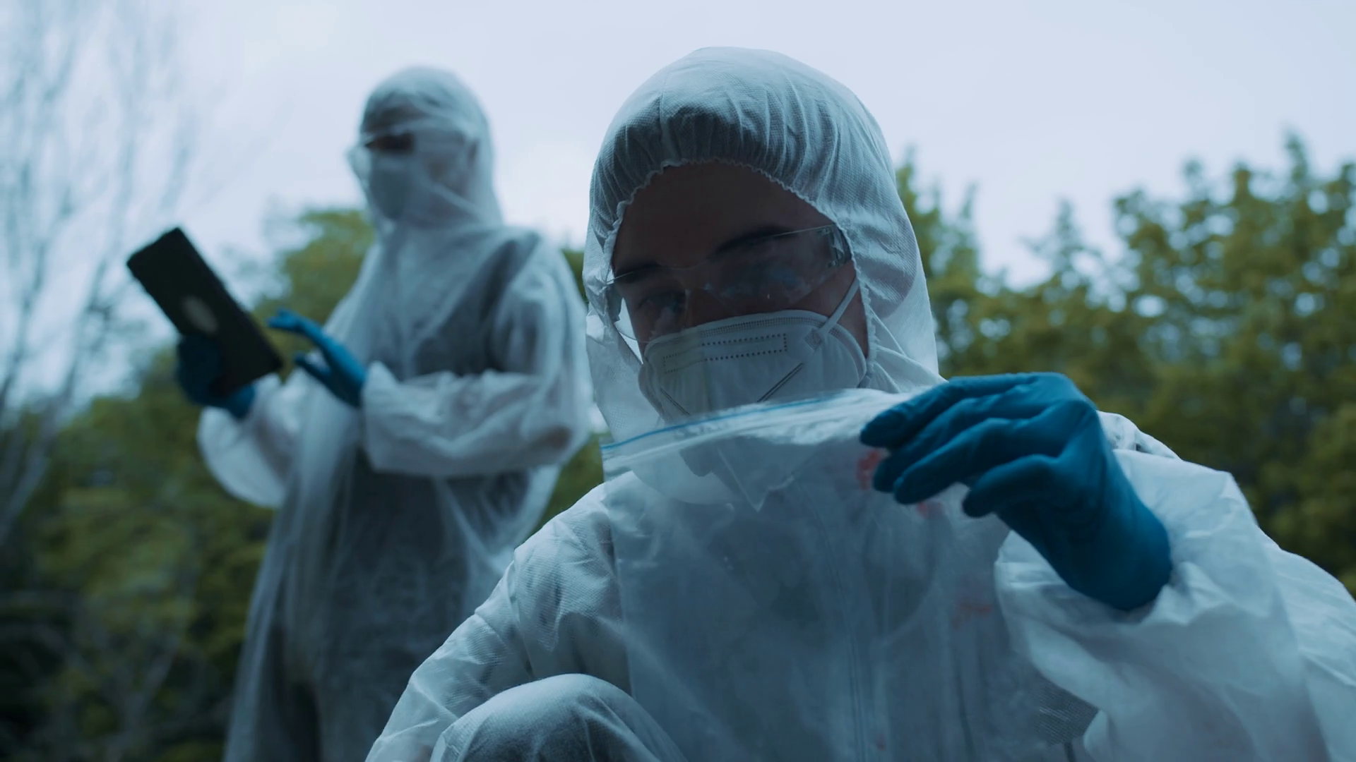 Criminalists Discovering Knife At Crime Stock Footage SBV346693653