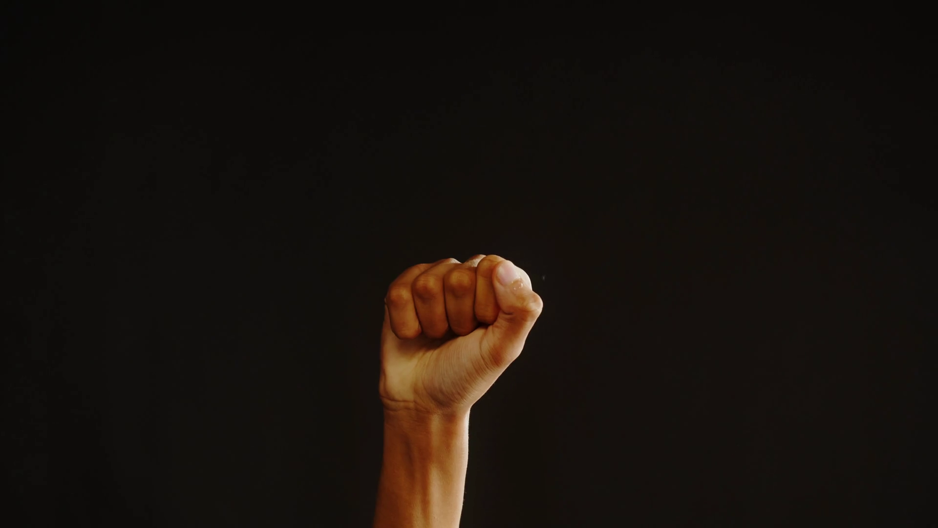 African American man showing rock and roll gesture with fingers ...
