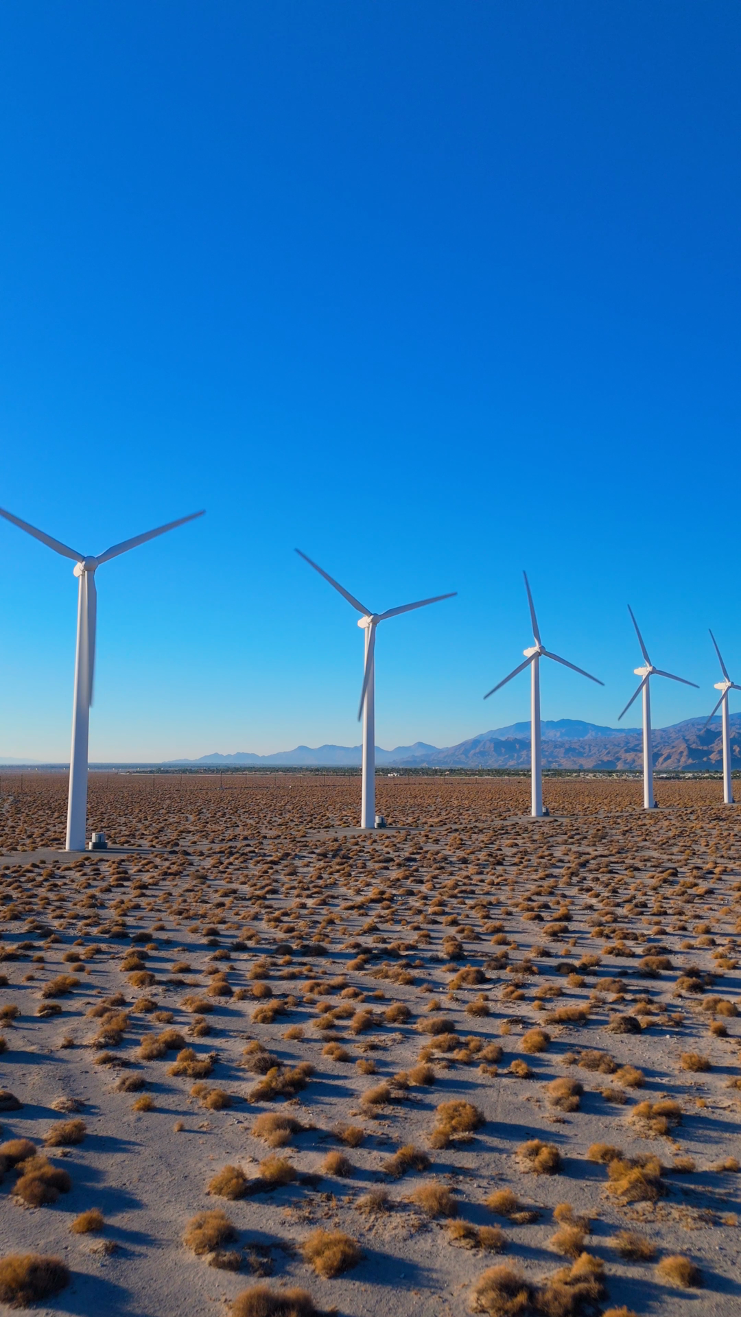 Vertical Drone Push Toward Wind Turbines Stock Footage SBV-353068618 ...