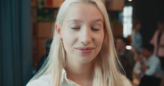 Close-up portrait of confident female business team leader at trendy office