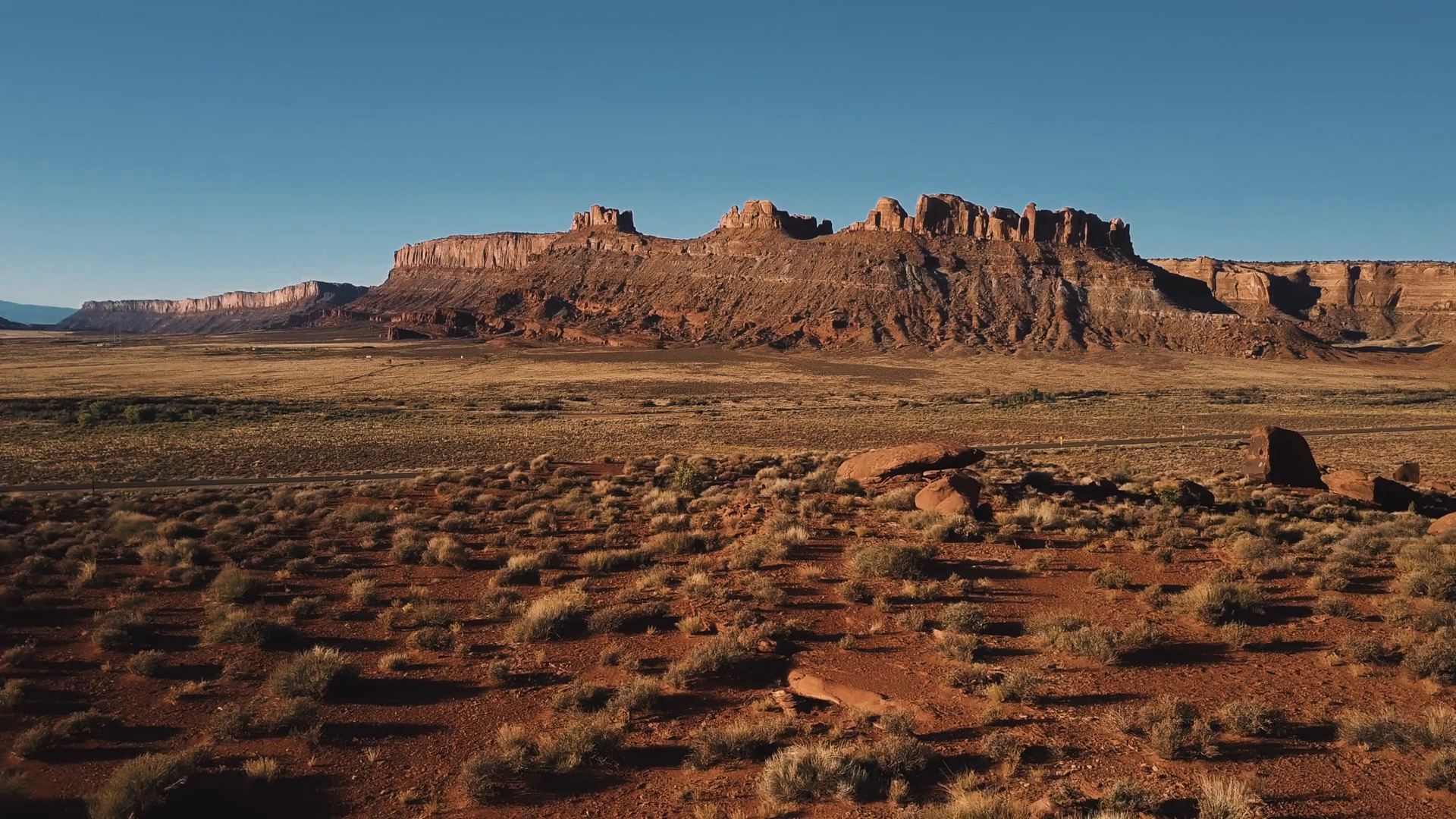 Aerial View Of Sandstone Desert Truck On Stock Footage SBV327626952