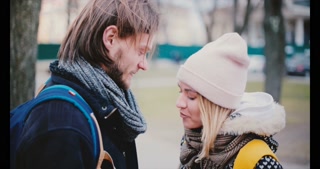 Smiling young couple on a winter date