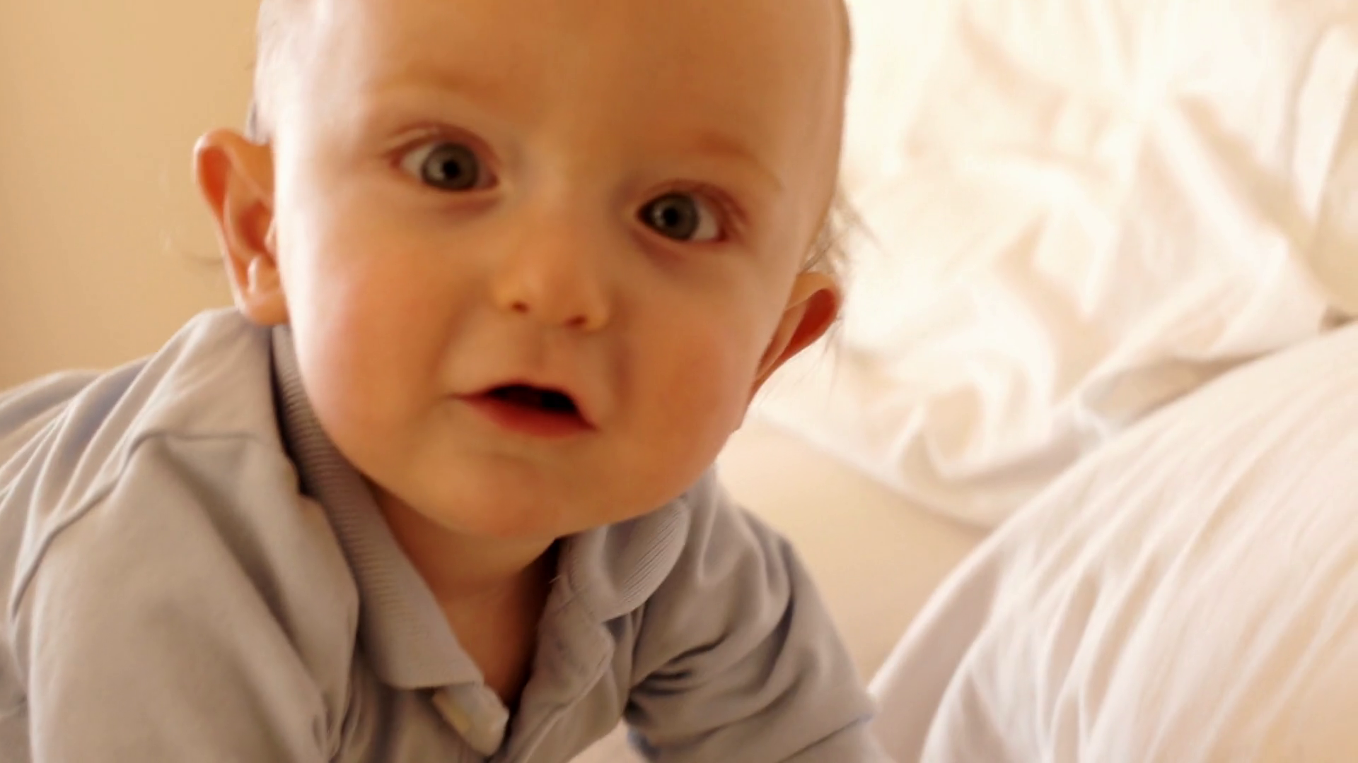 12 Month Old Baby Playing On Bed Indoors Stock Footage SBV300521149