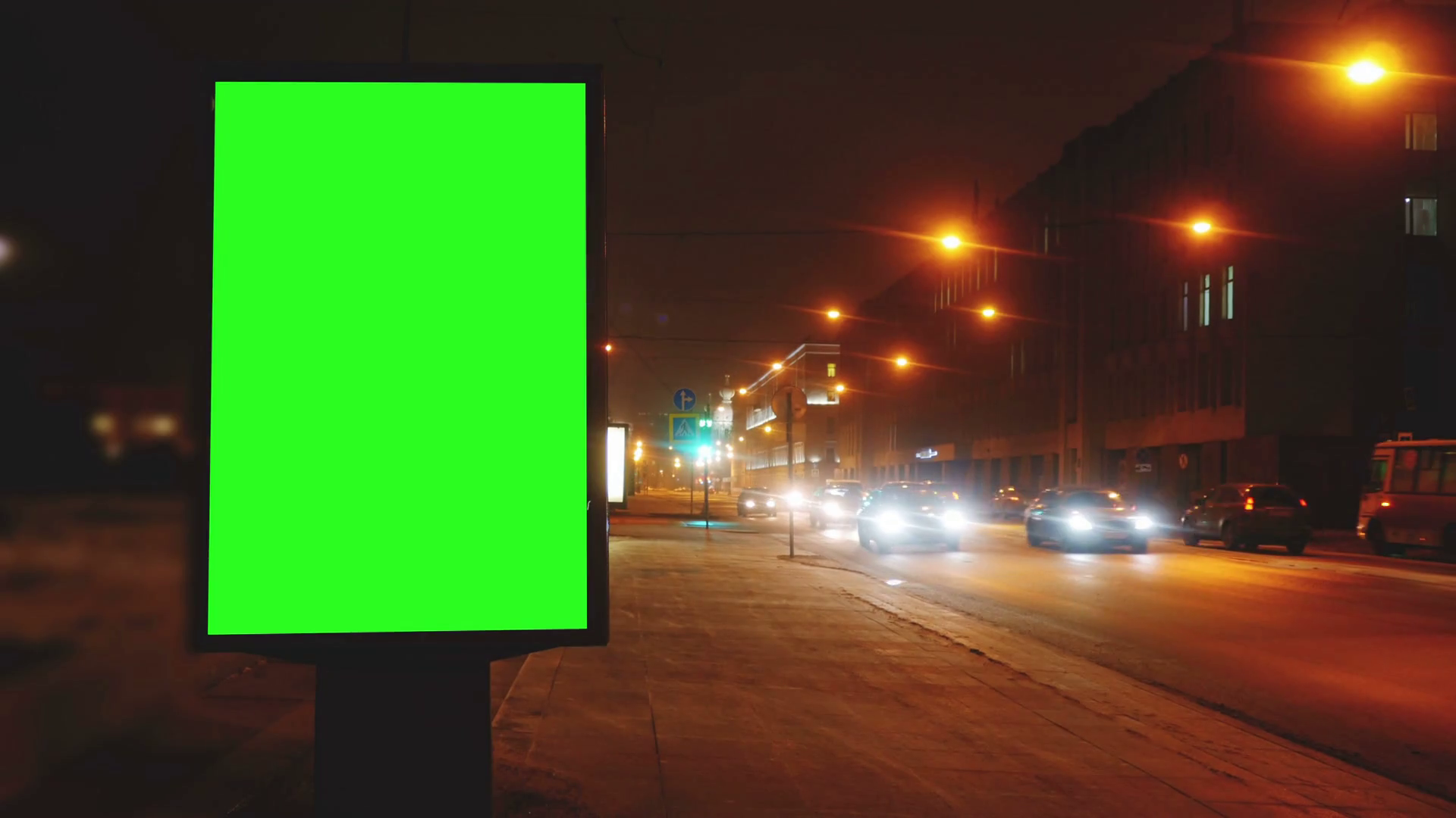 a Billboard With a Green Screen on a Streets Stock Video Footage