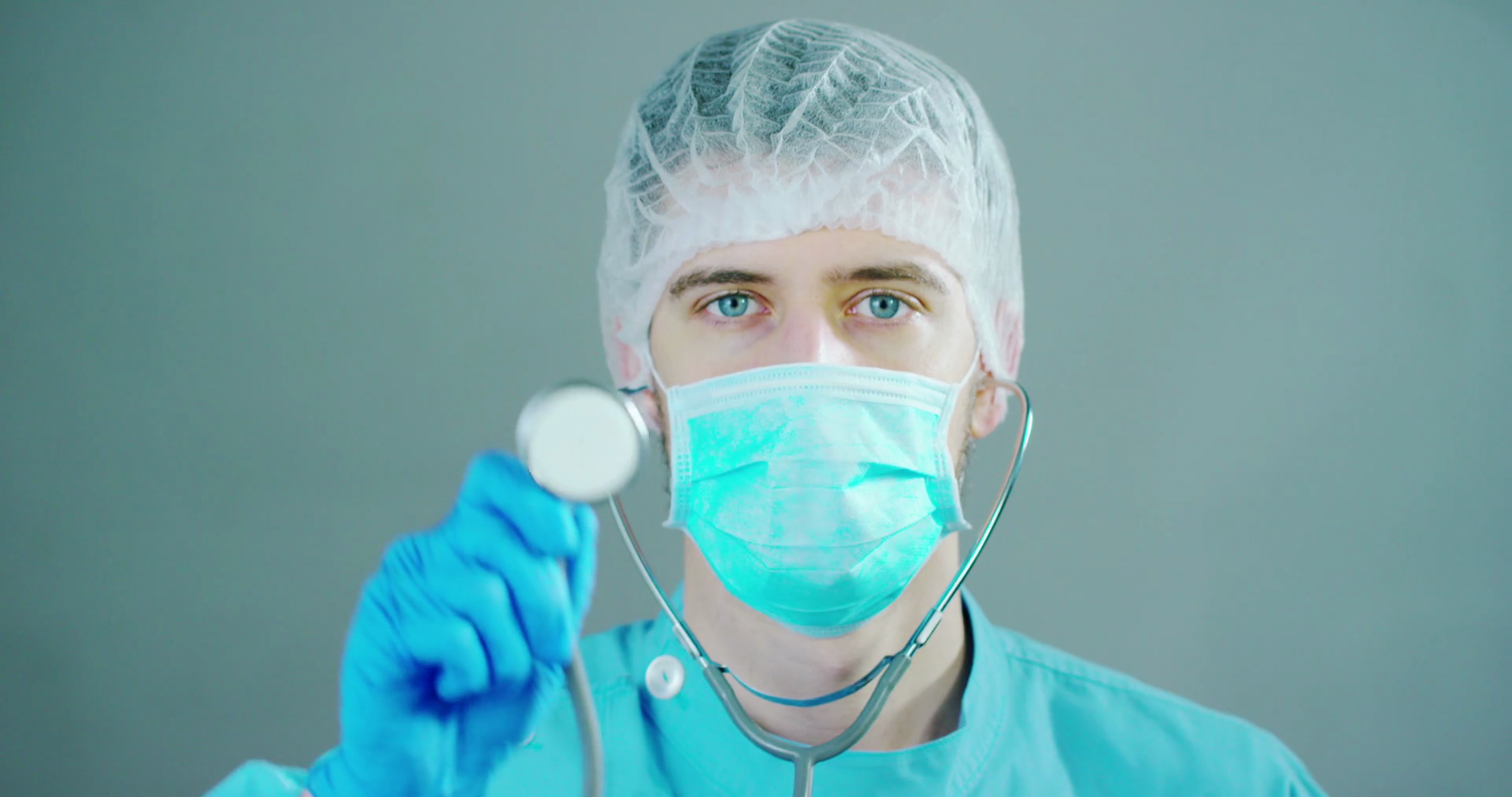 A futuristic doctor with syringe withdraws a liquid medicine and