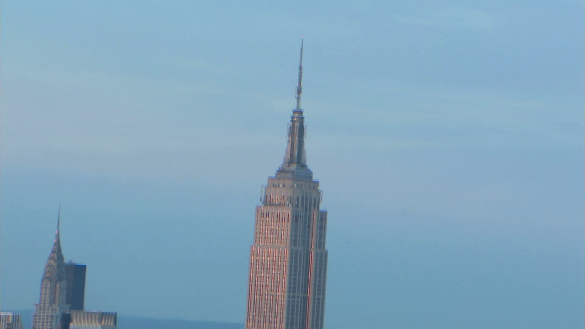 Aerial Evening Zoom from Empire State Building to City Stock Video