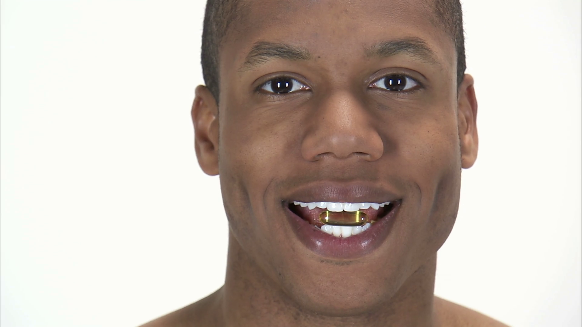 Black Man Holding Pill Between His Teeth 2 Stock Video Footage 0008
