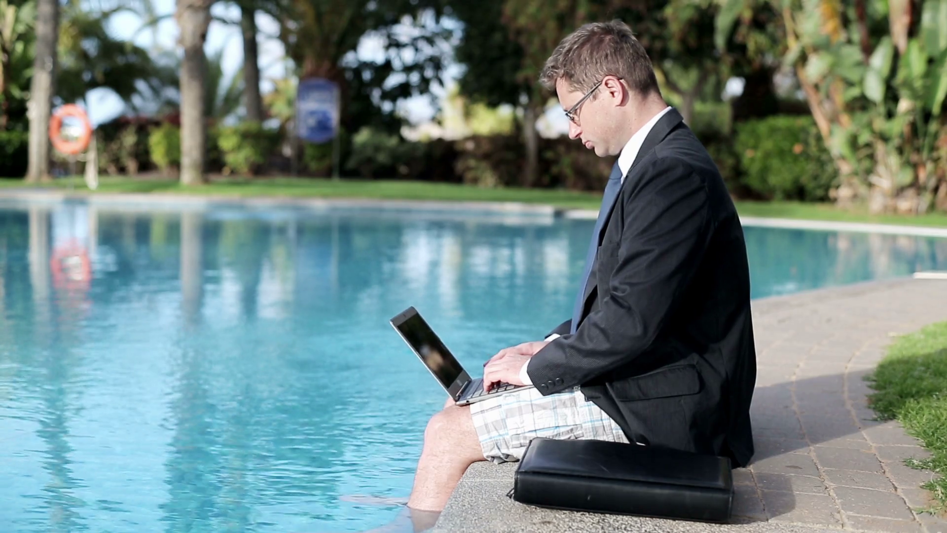 Businessman Working With Laptop On Vacation Stock Footage SBV302493571