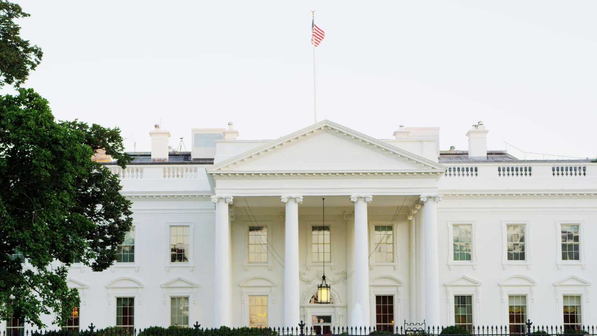 Flag Waving Over White House Stock Video Footage 0016 SBV300185271
