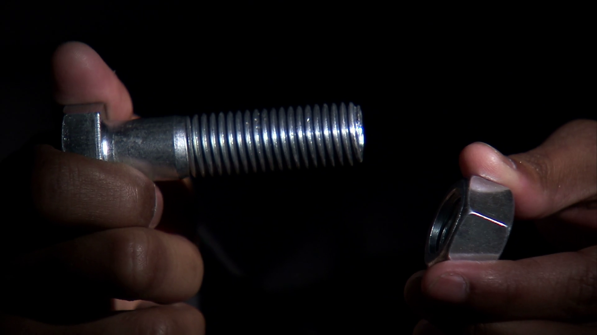 Hands Screw Nut Onto Bolt Stock Footage SBV300065696 Storyblocks