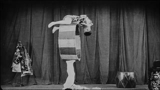 Japanese Performers Doing Tricks in Vaudeville Show