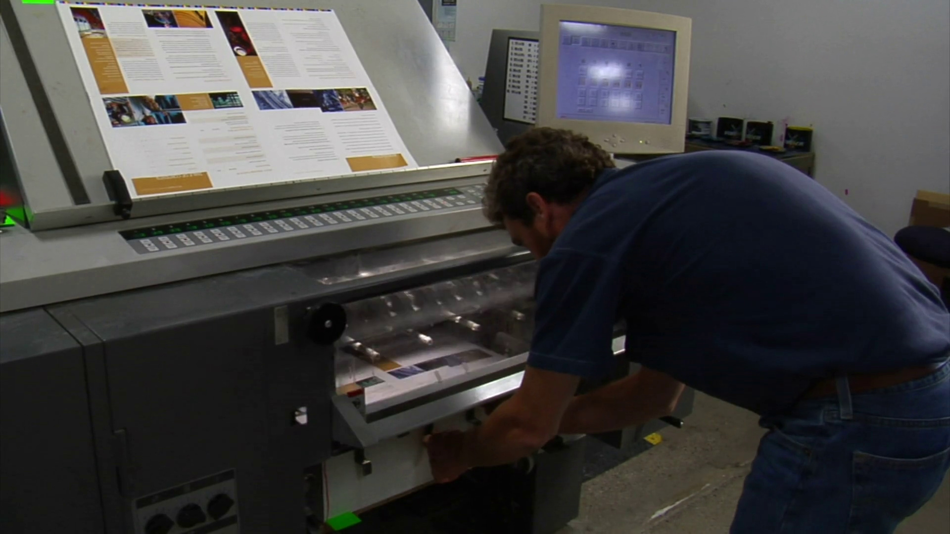 Printing Press Technician Examines Final Stock Footage SBV300147809