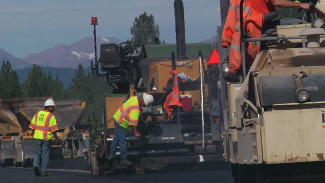 Paving The Road Stock Footage: Royalty-Free Video Clips - Storyblocks