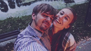 Young Couple Taking Selfie Outdoors. 4K Ultra HD. Love and Connection.