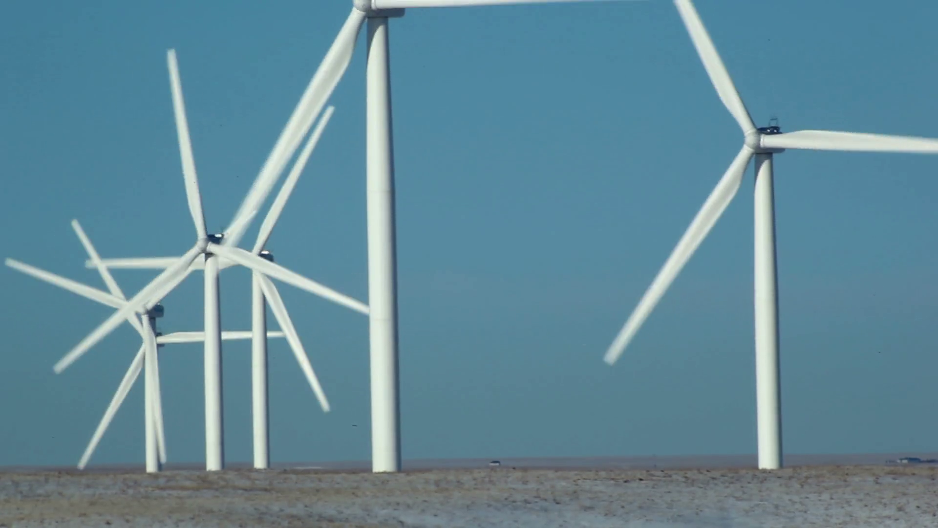 Row of Wind Turbines Spinning 3 Stock Video Footage 0015 SBV300094950