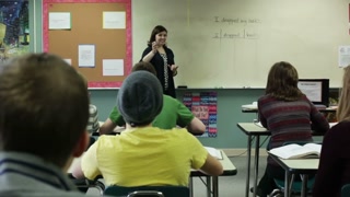 School Teacher Giving Lesson Plan