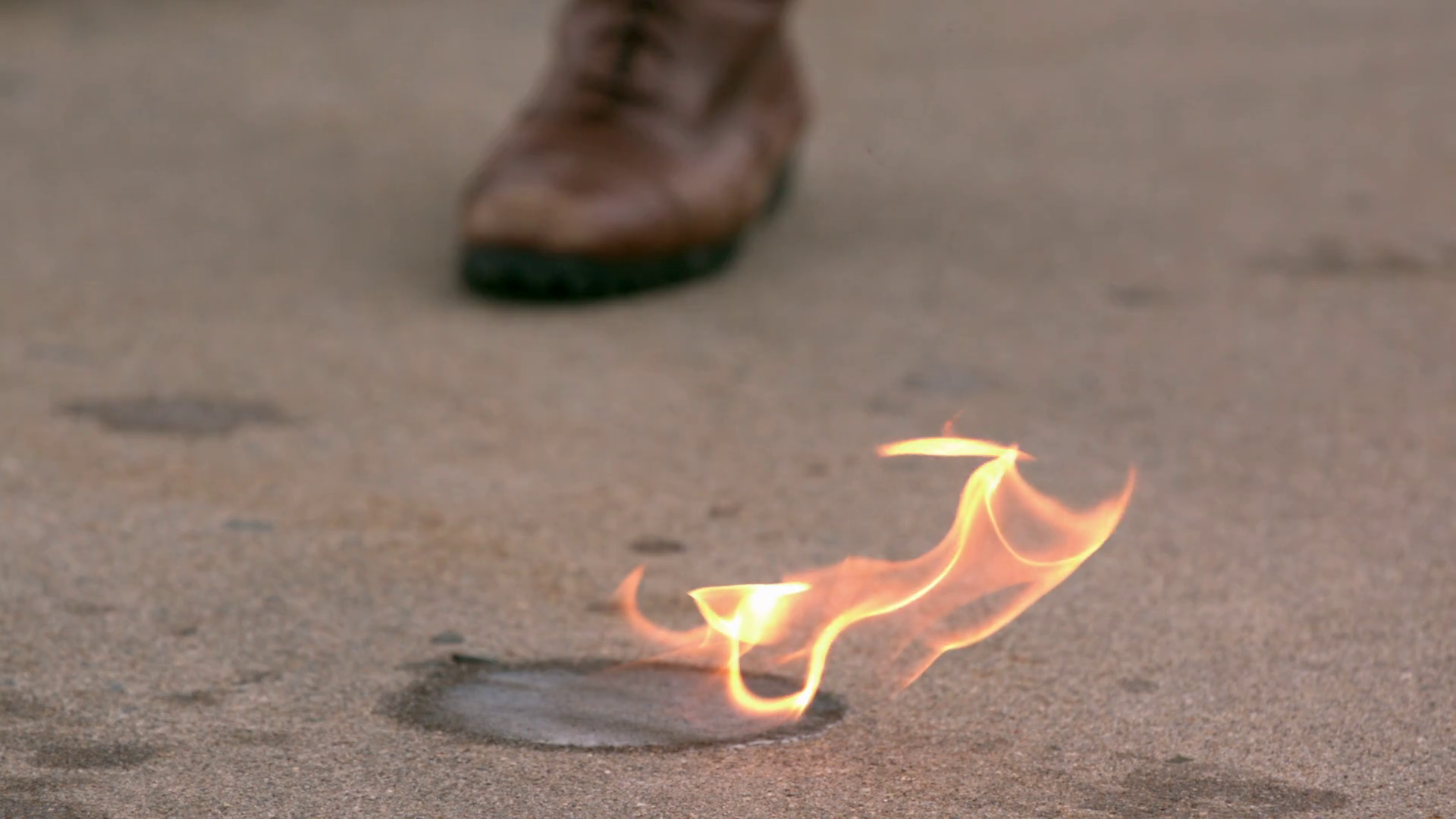 Slow Motion Pouring Water Onto Fire Stock Footage SBV300151863