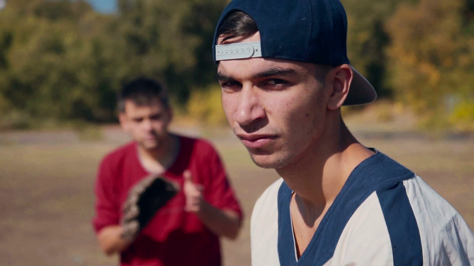 Slowmotion Young Male Batter Standing Ready for Pitch with Baseball Bat