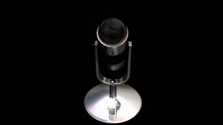 Spinning  silver microphone