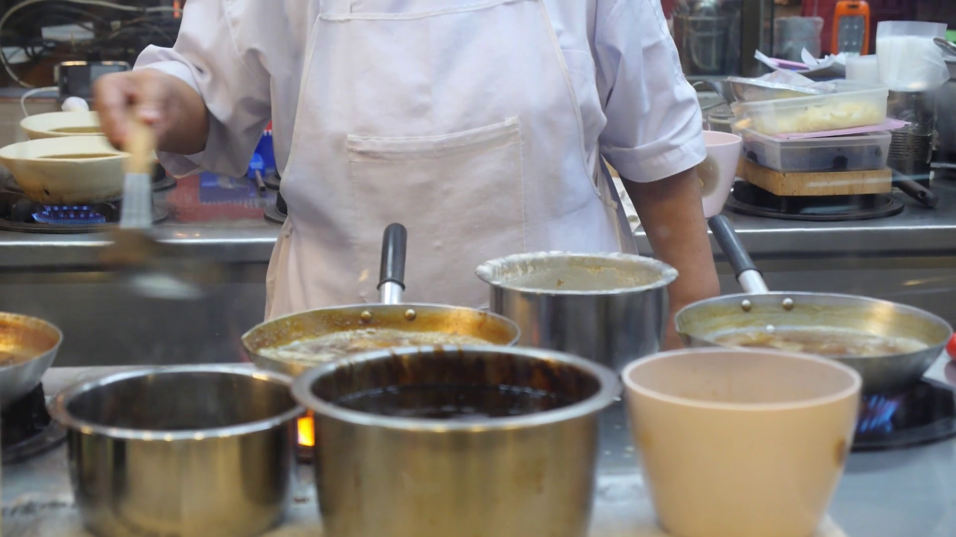 Thai Street Food Vendor Frying on Pan in Bangkok, Thailand Stock Video