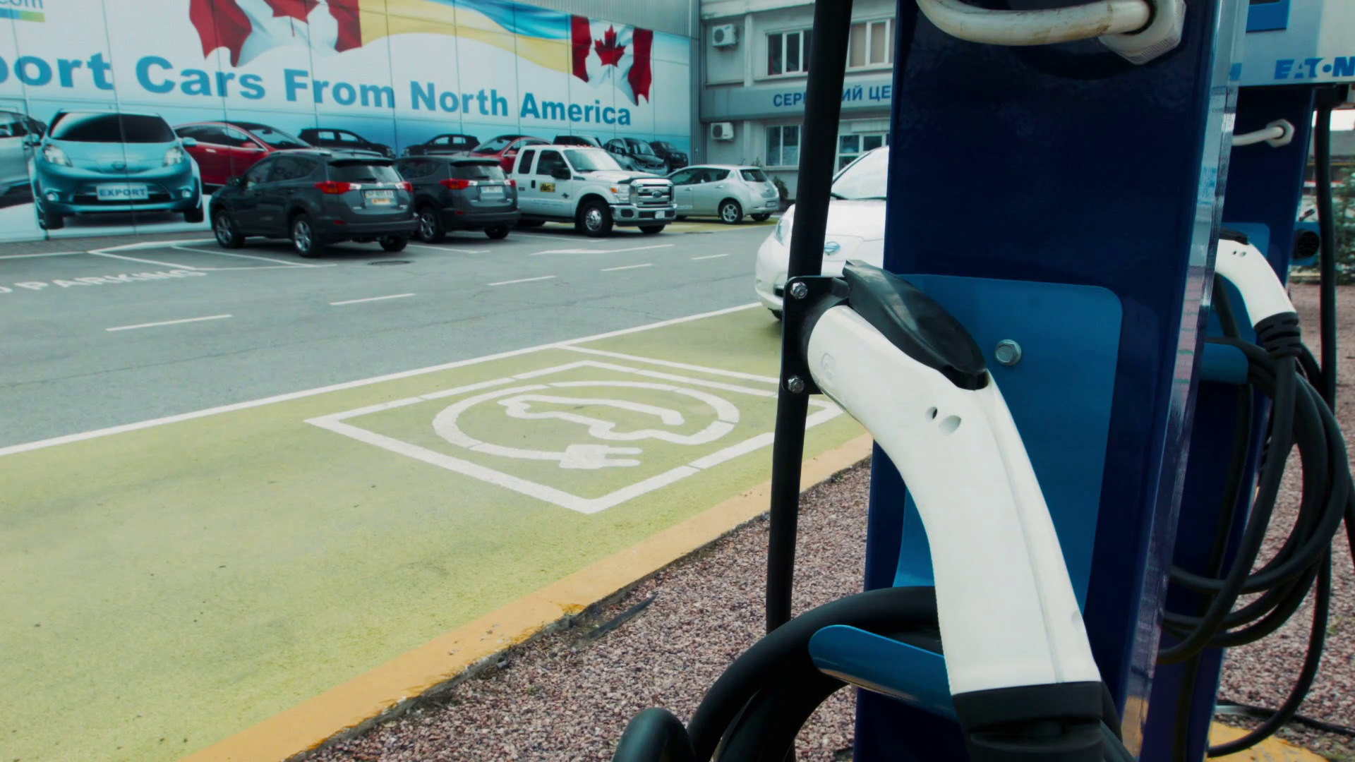 The approaching car to recharge station. Depot for recharging electric