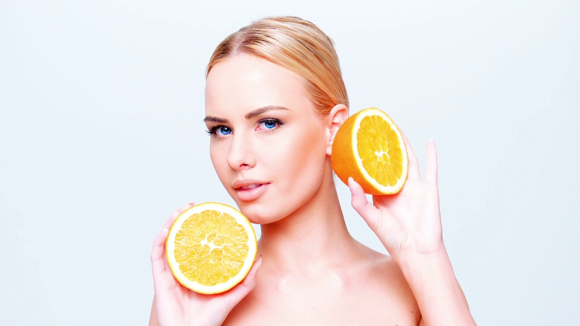 Beautiful Blond Girl Holding Orange Fruit While Isolated Stock Video ...