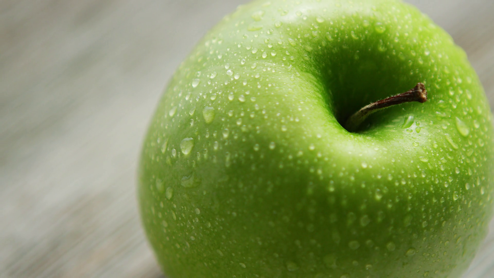 Closeup Fresh Healthy Green Apple With Water Stock Footage SBV 