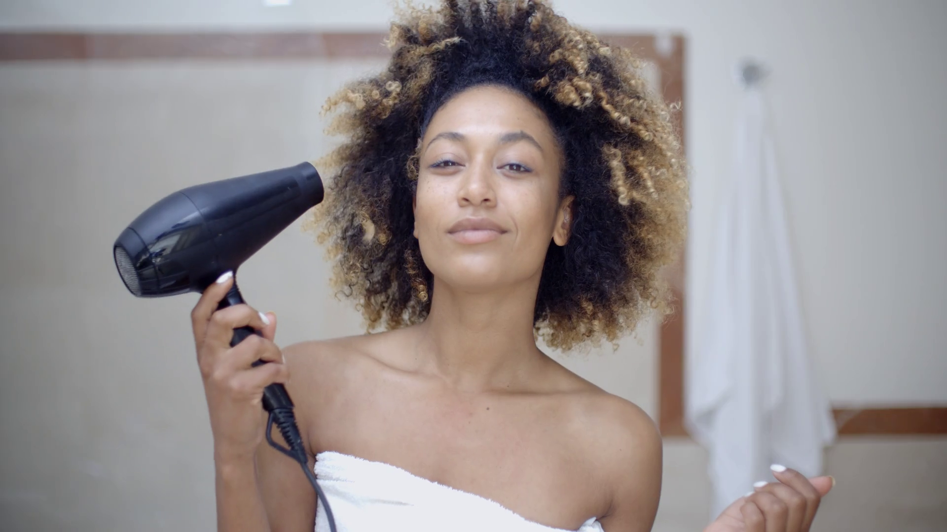 Woman Drying Her Hair With Hairdryer Stock Video Footage 0030 SBV