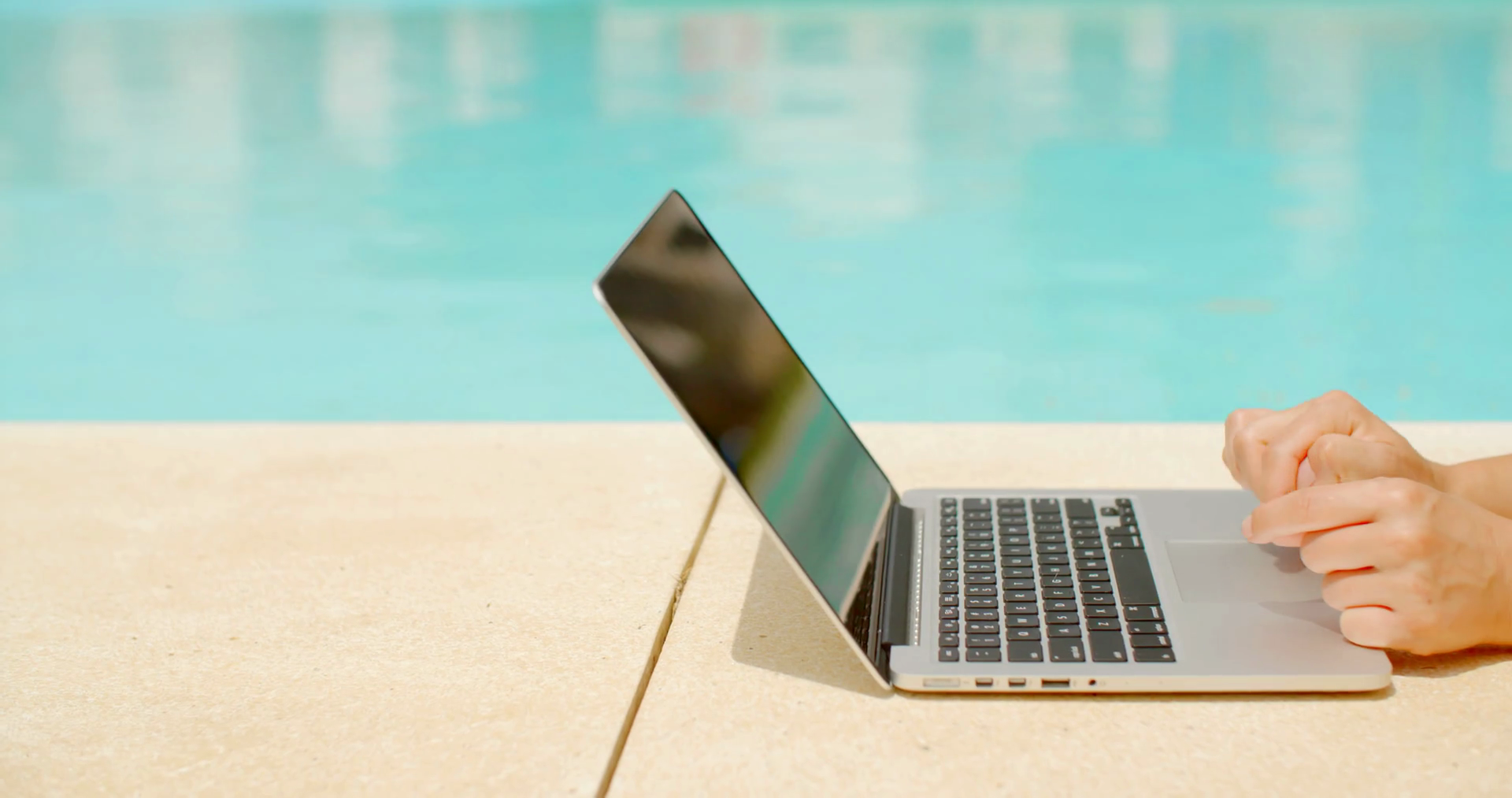 Working On Laptop In Swimming Pool Area Stock Footage SBV301819198
