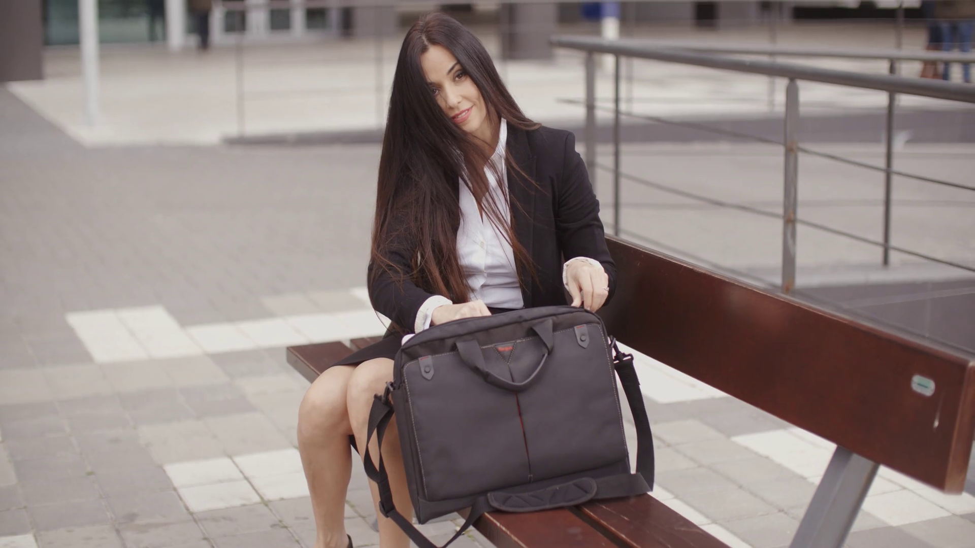Young Businesswoman Placing Laptop In Bag Stock Footage SBV304706201