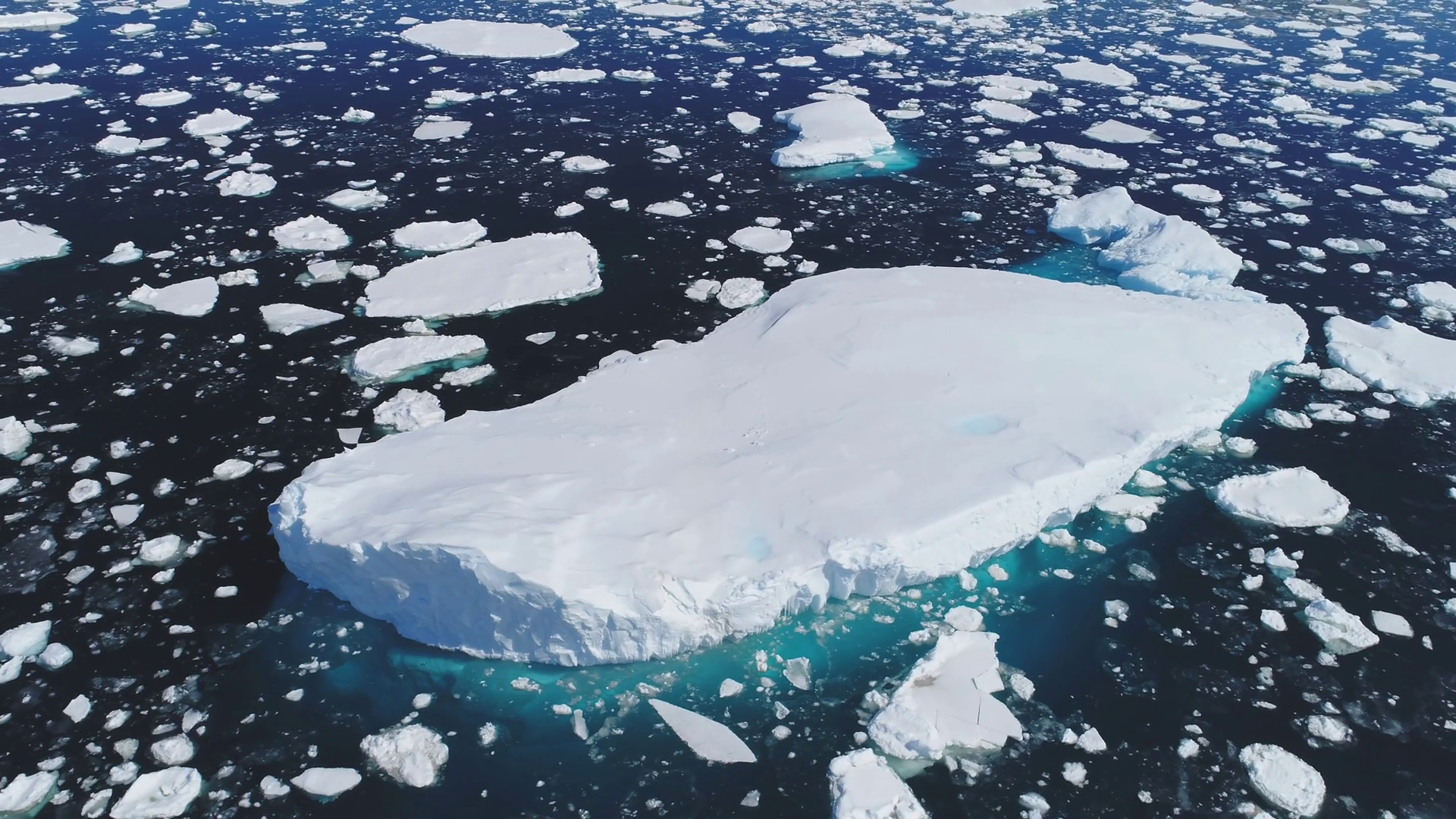 Huge Floating Iceberg Aerial Tracking Shot Stock Footage SBV-348410614 ...