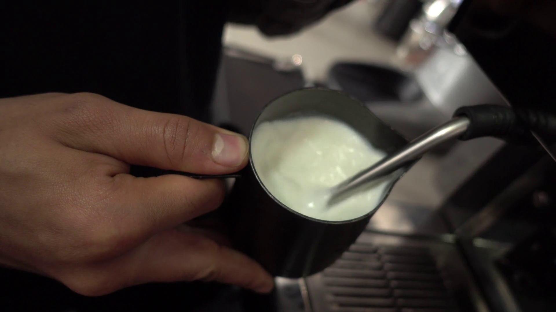 Barista Steaming Milk At The Coffee Machine. CloseUp Stock Video