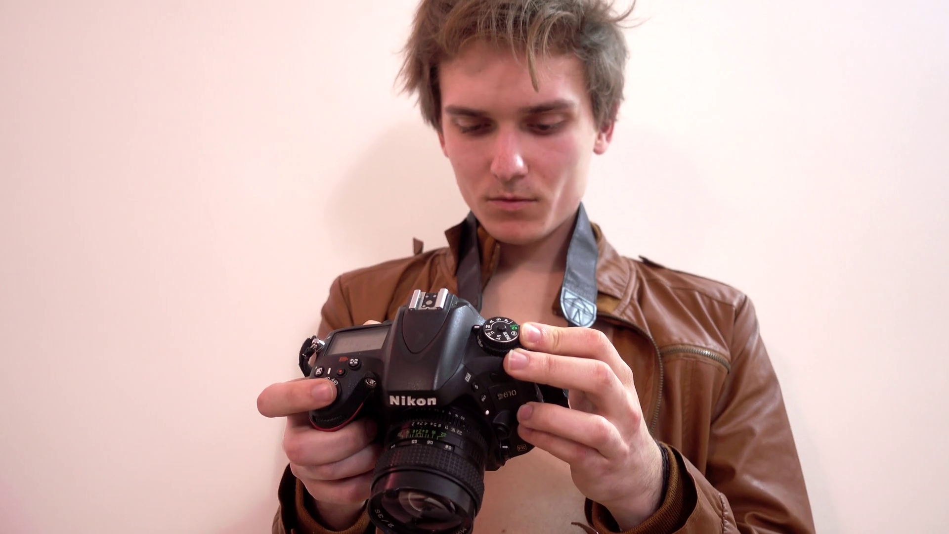 Camcorder operator photographer adjusts a focus lens taking photo set