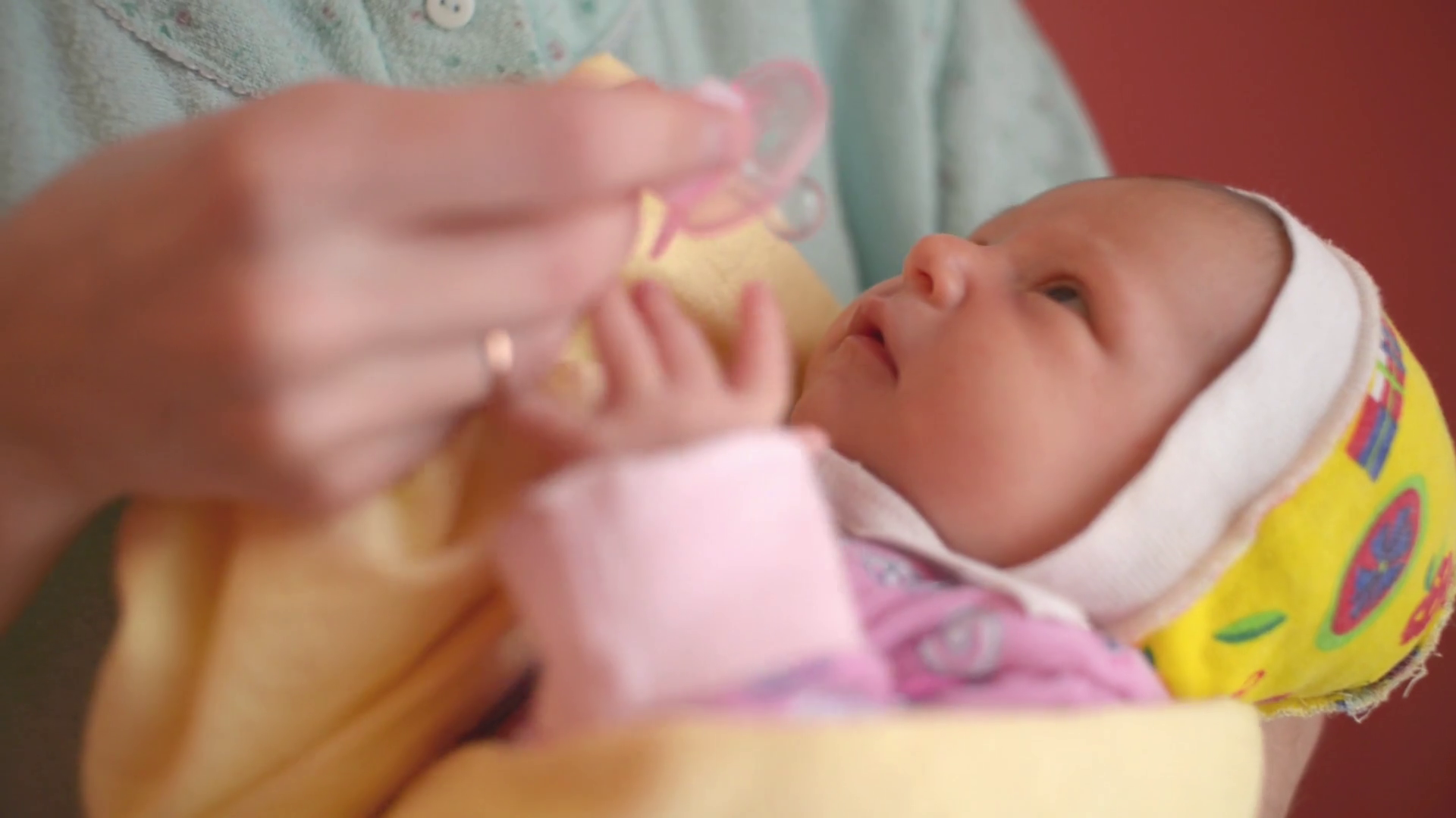 Mom Gives Pacifier To Newborn Baby Baby Stock Footage SBV311418852