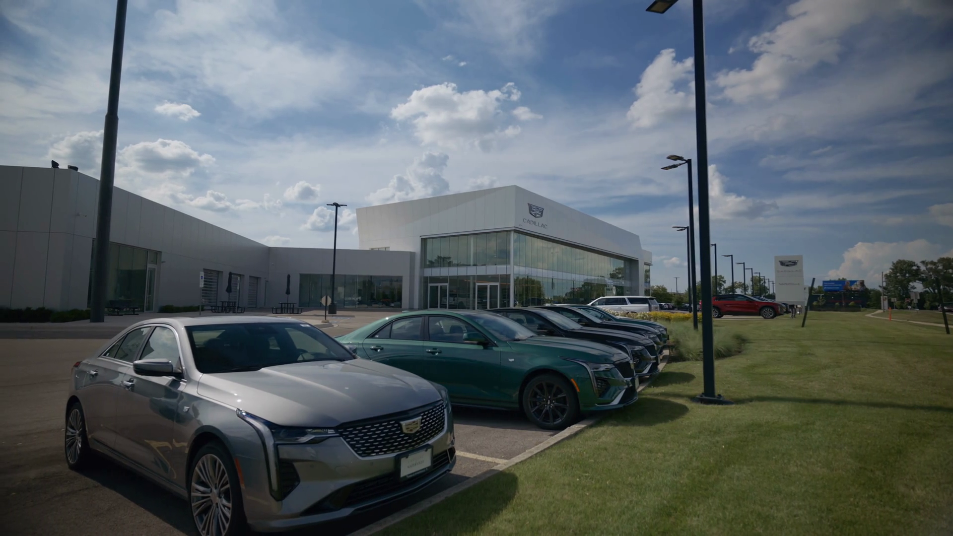 The Exterior Of Cadillac Dealership On Sunny Stock Footage SBV ...