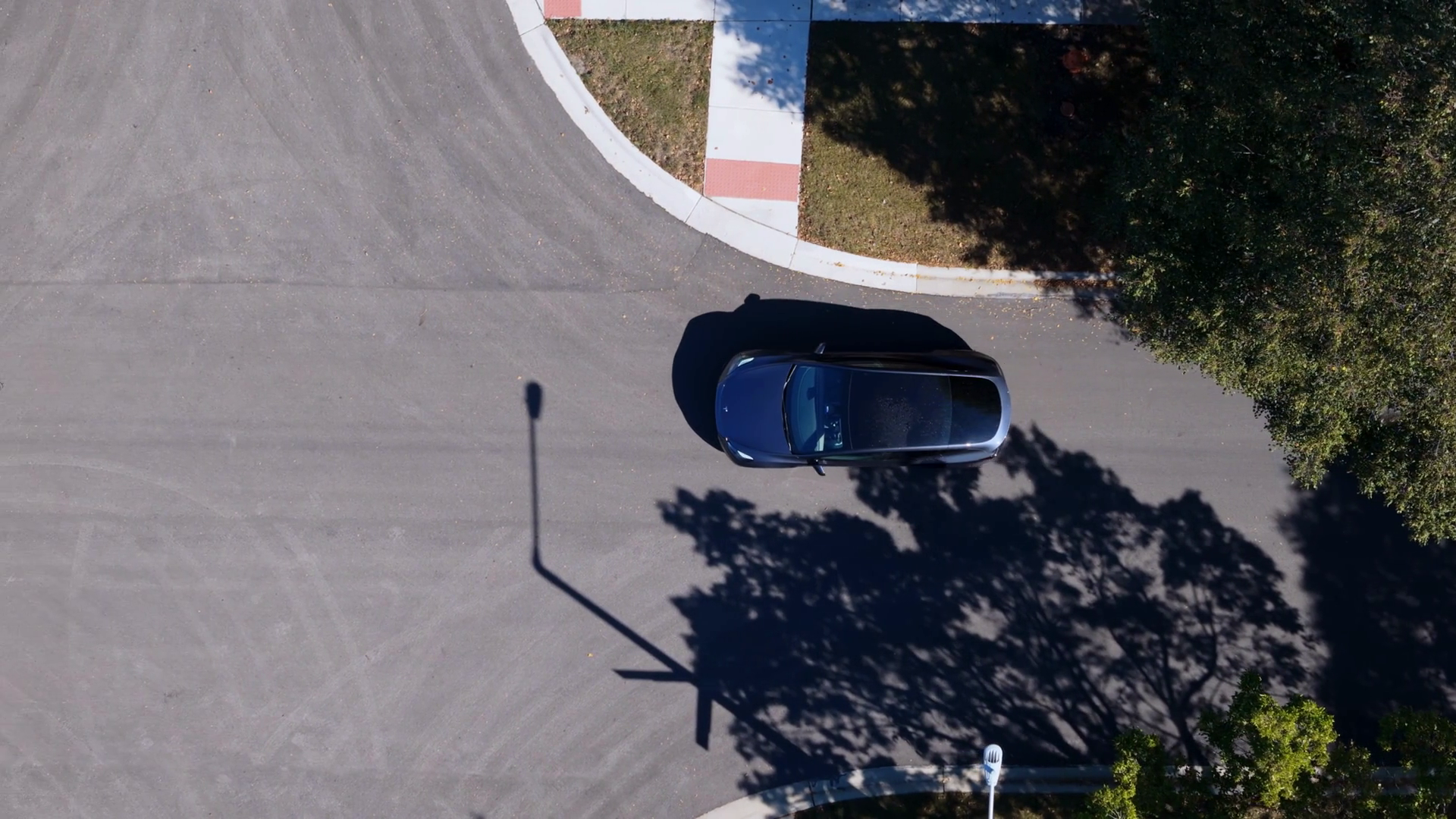 Top-down Aerial Drone Shot Of Tesla Car Stock Footage SBV-353248515 ...
