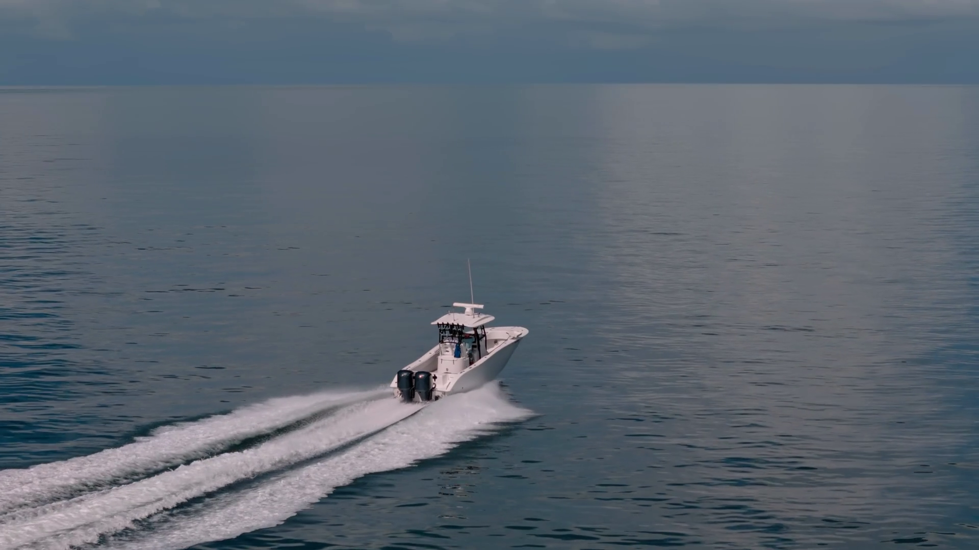 Aerial Zoom Shot Of Boat Sailing To Blue Sea Stock Footage SBV ...