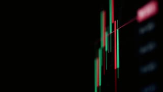 Stock market data displayed on a screen showing financial trading trends