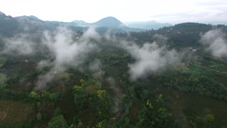 Aerial view of fog in forest of mountain villages in Merida Venezuela after rain