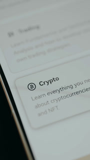 Close up of a digital screen encouraging users to explore crypto education
