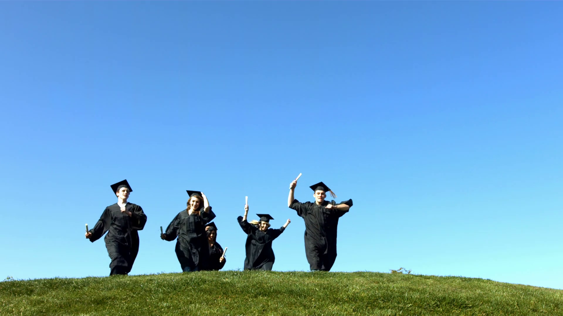 Graduates Running Over Hill Slow Motion Stock Footage SBV-348369223 ...