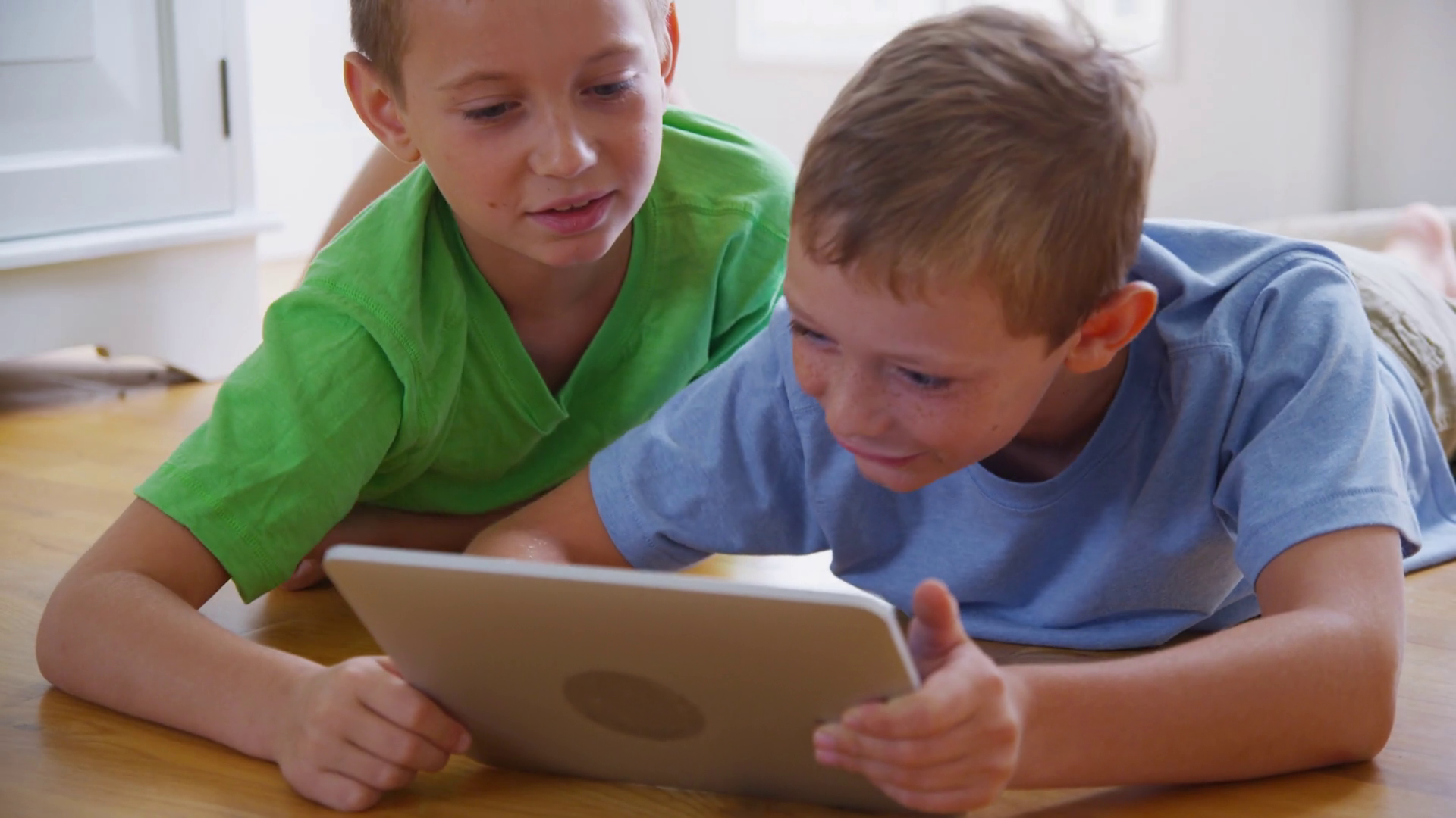 Two Children Using Digital Tablet Together Stock Footage SBV-347587144 ...