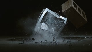 Concrete block is dropped on television in slow motion; shot on Phantom Flex 4K at 1000 fps
