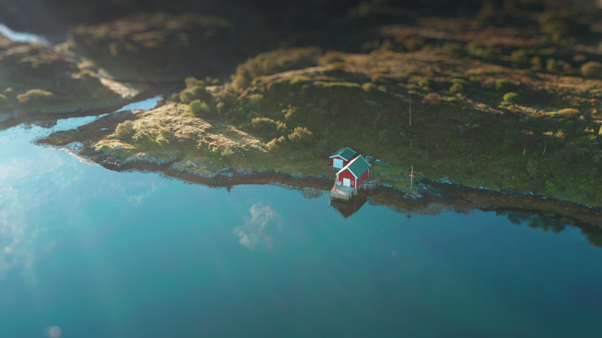 A Small Red Boathouse Barn On Rocky Coast Of Stock Footage SBV ...